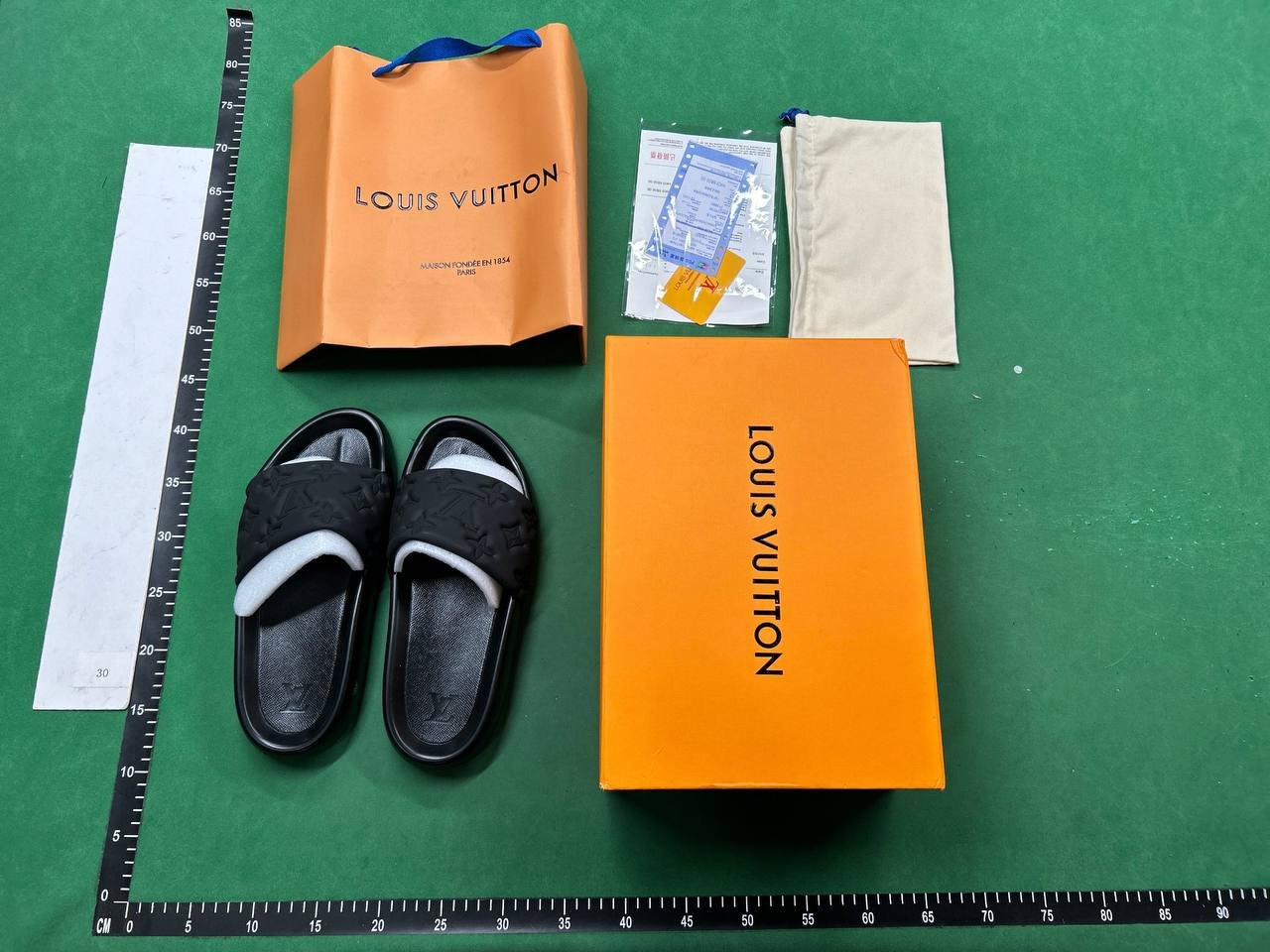 LOUIS VUITTON SLIDES