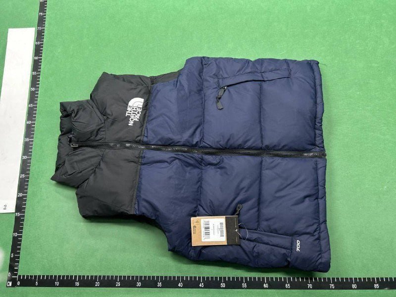 The north face down jacket vest    (40 CP)